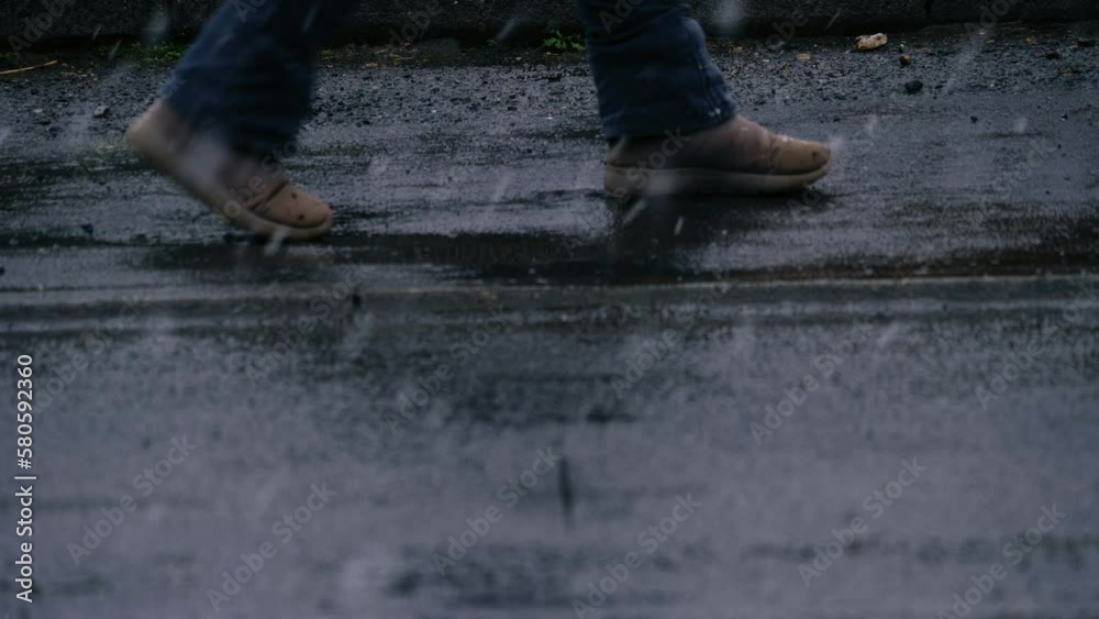 Legs walking on street in snow medium shot Legs walking on street in snow medium shot