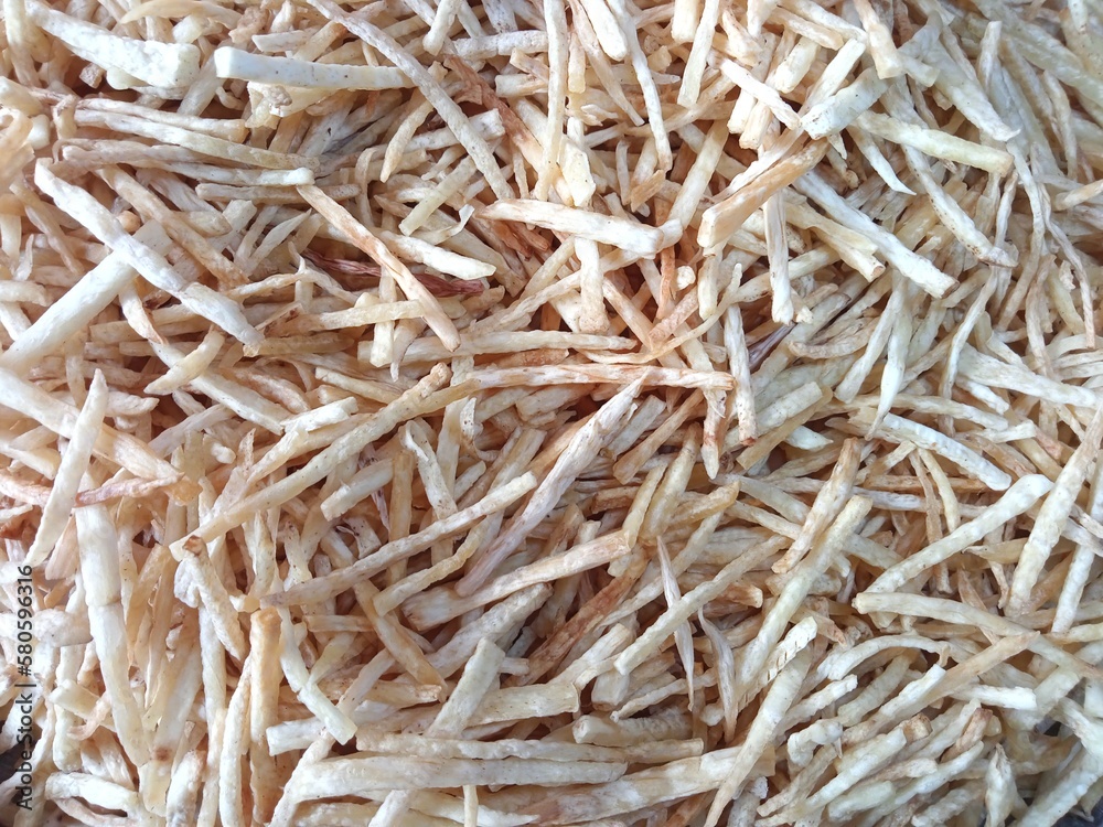 close up of taro chips that have been fried but not yet seasoned close up of taro chips that have been fried but not yet seasoned