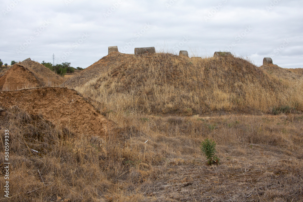 Small private wine cellars, underground with vents in the mounds in Villamañan, Castilla y León