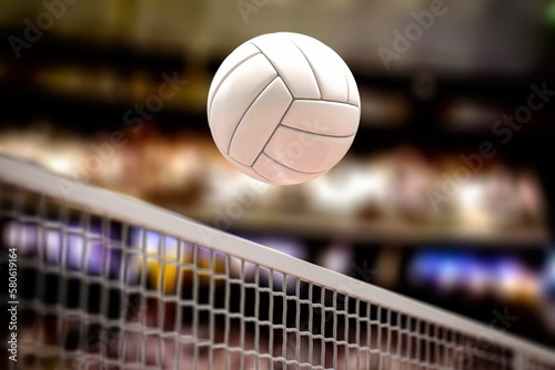 Volleyball ball and net in voleyball arena during a match. photo