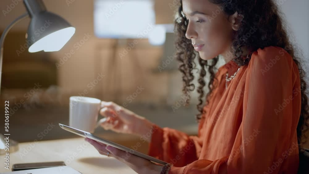 Remote work, tablet and woman designer drinking coffee while working on a design on a calm night using internet. Online, website and freelancer or professional person reading email on web