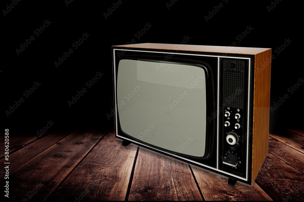 Old retro TV on dark background
