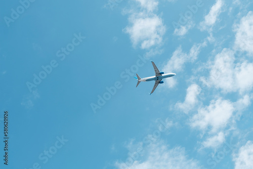 Airplane flying in sky © IrinaK