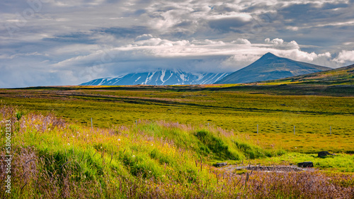 Panoramic view over a highland ex glacial land and surreal volcanic mossed landscape in Iceland, summer, with dramatic sky