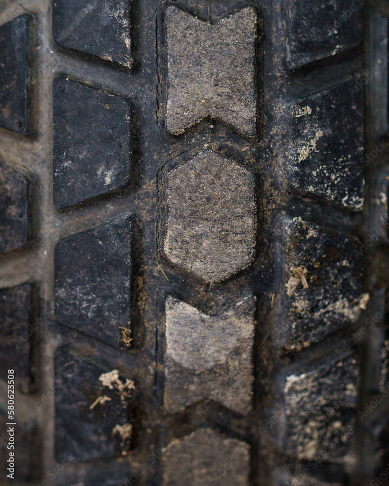 Tractor tire detail with dirt