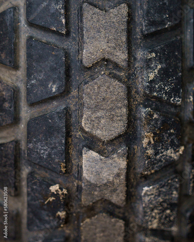 Tractor tire detail with dirt