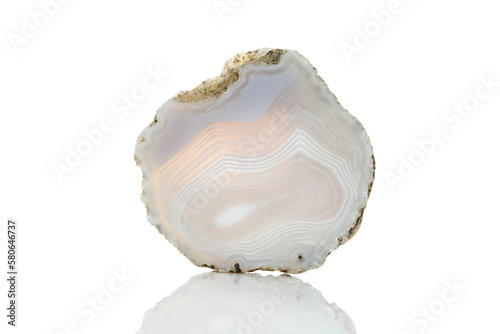 Ornamental natural stone with unpolished cut isolated on white background.