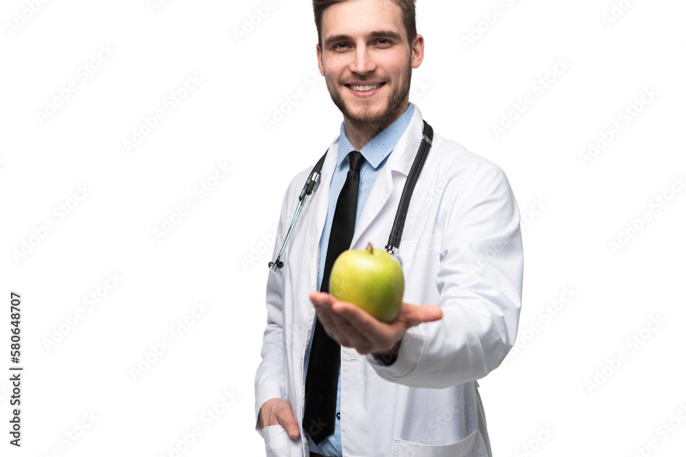 Portrait of handsome doctor in white coat looking at camera and smiling while holding an apple, isolated Portrait of handsome doctor in white coat looking at camera and smiling while holding an apple, isolated