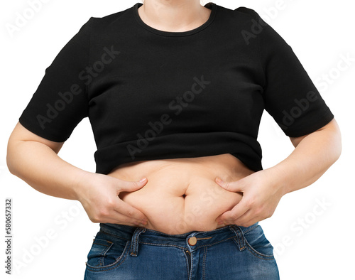 Leinwand Poster Women in jeans hand holding excessive belly fat