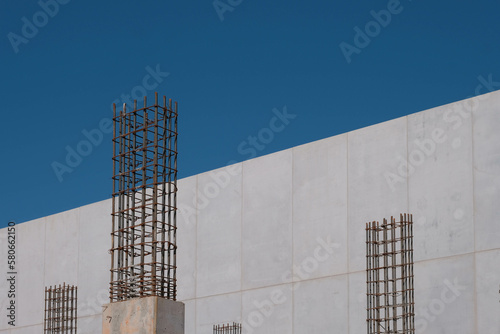 Rebar and pilings with new cement wall in Charlotte, NC.