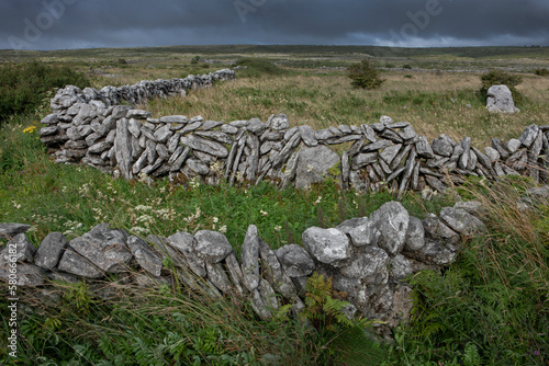 Clare County. Westcoast Ireland. Karstlandscape. Megalitic. Killarney. Rocks. Piles of rocks. The Burren. Wall of stones.  photo