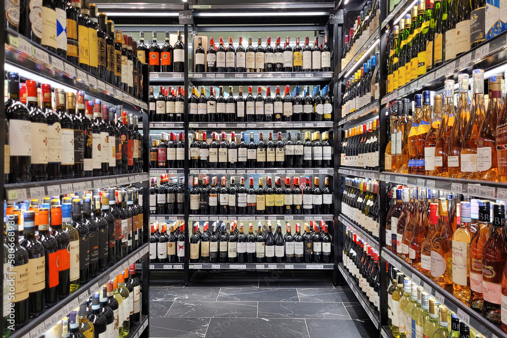 KUALA LUMPUR, MALAYSIA 12 MARCH 2023 An assortment of imported wine and hard liquor bottles