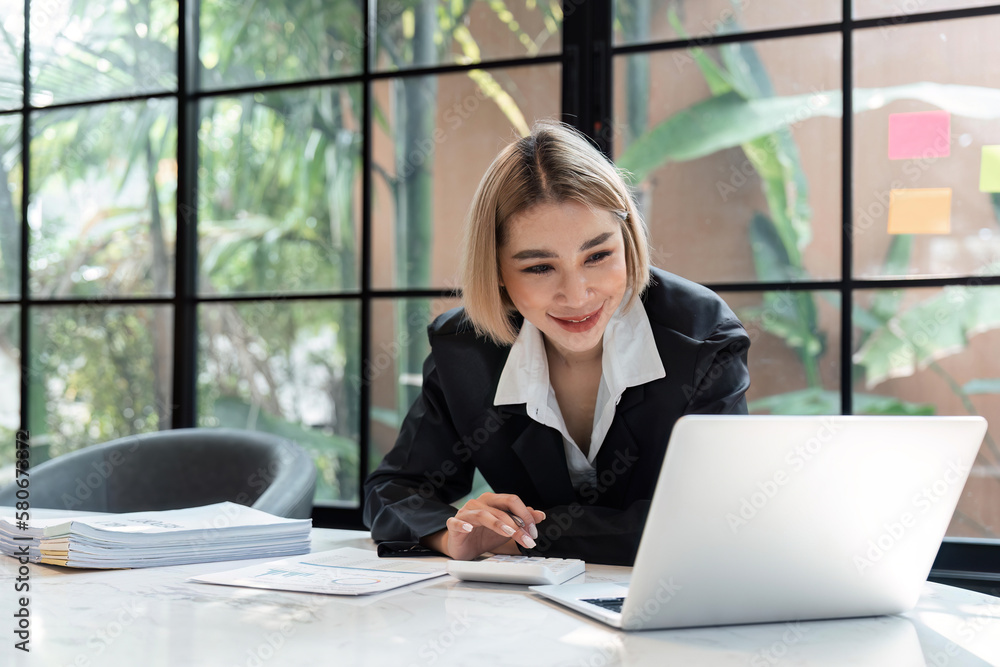 Accountant woman working on laptop and do document, tax, exchange, accounting and Financial advisor concept Accountant woman working on laptop and do document, tax, exchange, accounting and Financial advisor concept