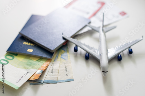 Top view of traveler accessories, hat, glasses, camera, passports and air tickets on background with copy space for text. Travel vacation concept