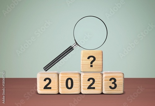 Magnifying glass and set of wooden cubes