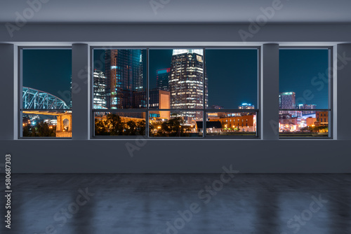 Downtown Nashville City Skyline Buildings from High Rise Window. Beautiful Expensive Real Estate overlooking. Epmty room Interior Skyscrapers View Cityscape. Night Tennessee. 3d rendering.