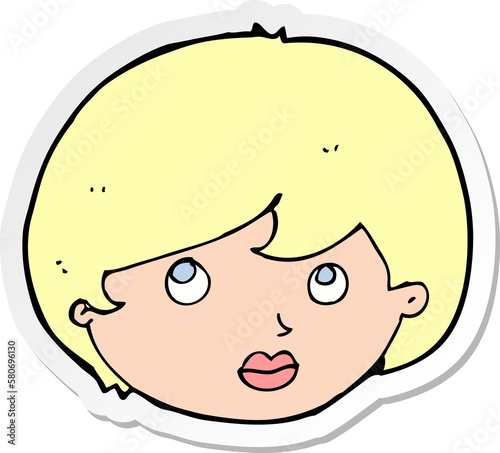 sticker of a cartoon female face looking upwards