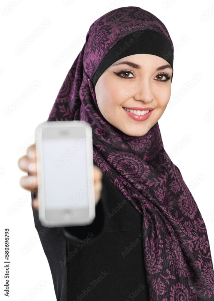 Muslim woman showing cell telephone isolated on white Muslim woman showing cell telephone isolated on white
