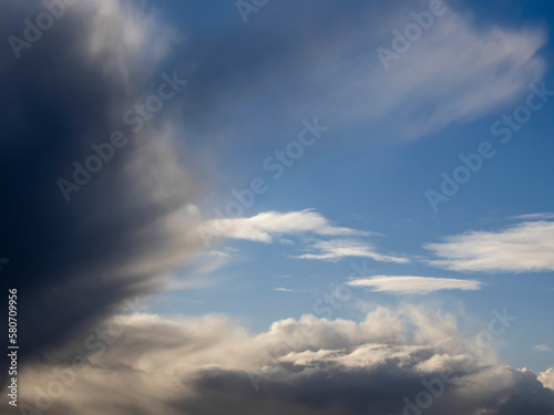 Cloudy blue sky. Nature background for design and sky replacement. © mark_gusev