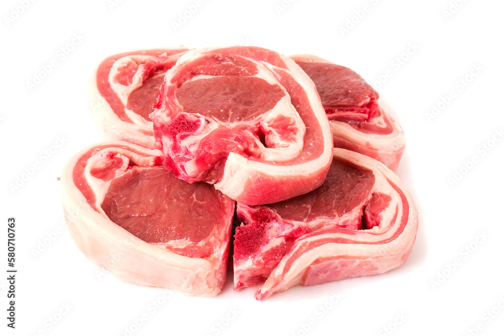Four raw lamb chops on white background. Meat product of high quality and value. Food supply business. Four raw lamb chops on white background. Meat product of high quality and value. Food supply business.