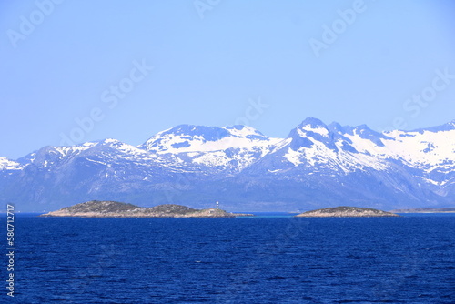 Fototapeta Naklejka Na Ścianę i Meble -  Mountains and fjords on Lofoten islands, Norway viewed from the boat