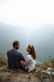 Backpacking couple enjoys a trip through Southeast Asia on their motorcycle trip through the HA GIANG loop, Vietnam