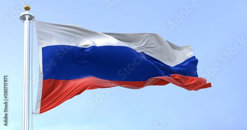 The national flag of Russia waving in the wind on a clear day