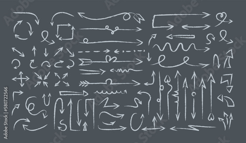 A huge set of arrows. Vector illustration of hand-drawn pointers. Doodle wavy and curved pointer elements with swirls 