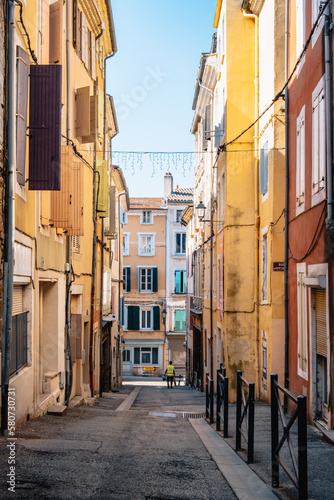 The colorful streets of Annonay with their parge coatedt houses with bright colors, in the south of France (Ardeche)