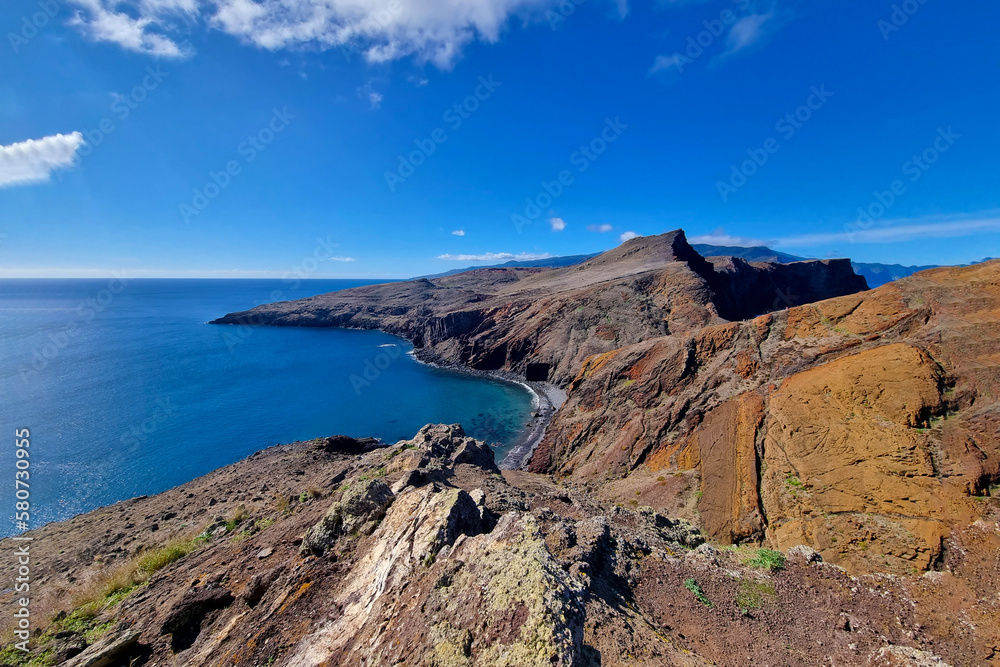 Beautiful bright slopes of mountains on an island in the ocean or sea. Beautiful bright slopes of mountains on an island in the ocean or sea.