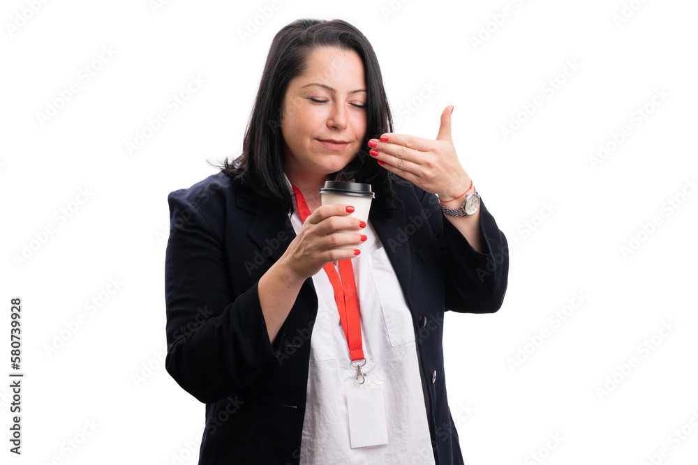 Female corporate smelling hot morning coffee from take-away cup Female corporate smelling hot morning coffee from take-away cup