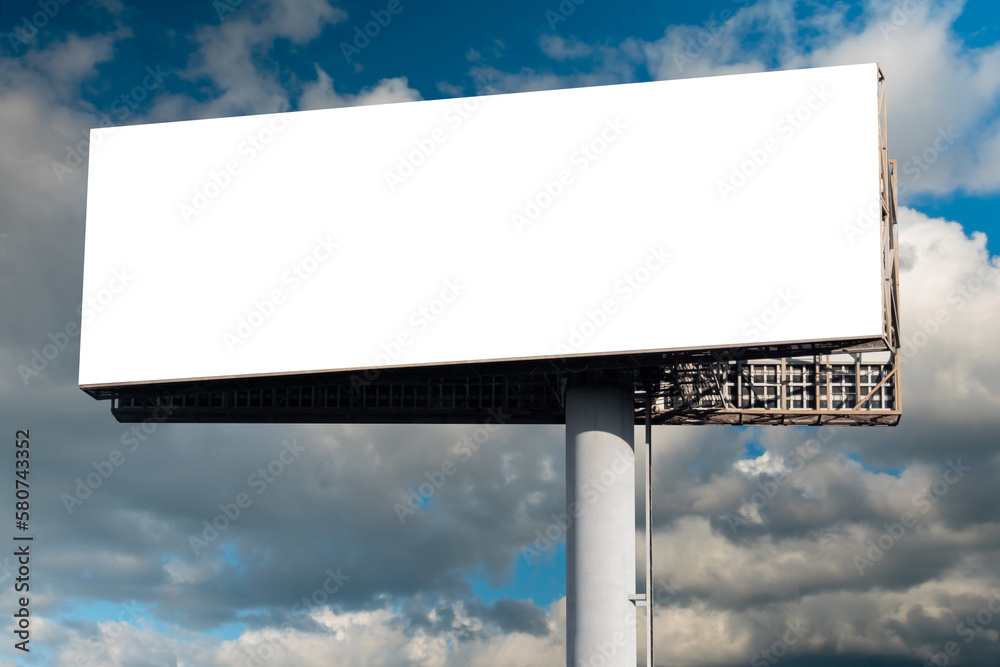 Mock up - blank wide white billboard or large advertising display against blue sky with white clouds. White screen, template, mock up, consumerism and copy space concept Mock up - blank wide white billboard or large advertising display against blue sky with white clouds. White screen, template, mock up, consumerism and copy space concept