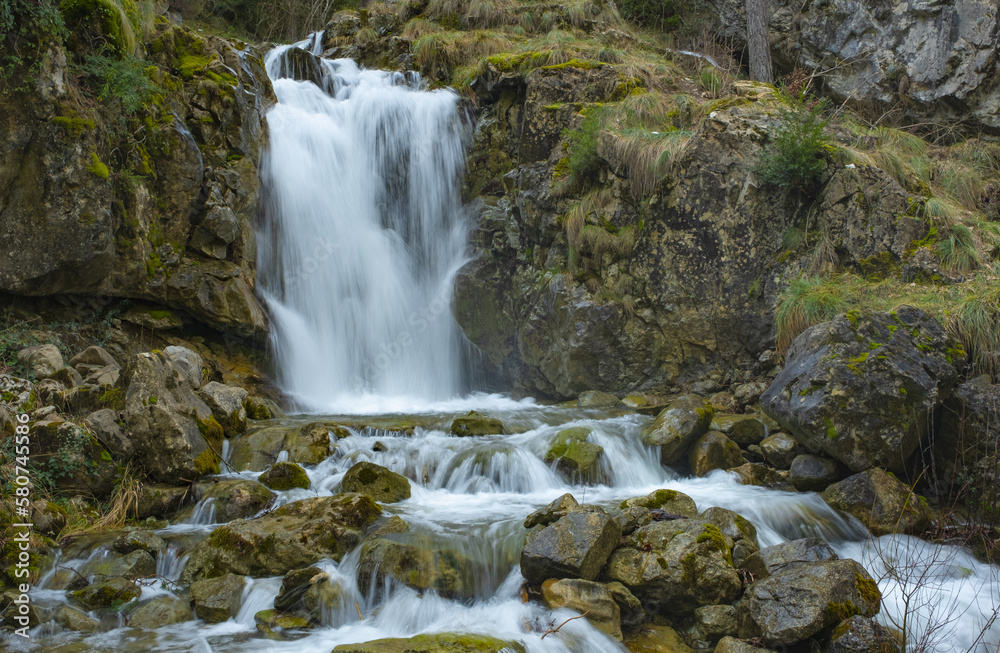 Fototapeta premium Waterfall by the river Esca, Isaba, Roncal Valley, Navarra, Spain