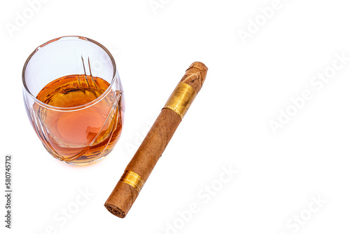 Fototapeta Naklejka Na Ścianę i Meble -  glass of cognac and cigar on white background