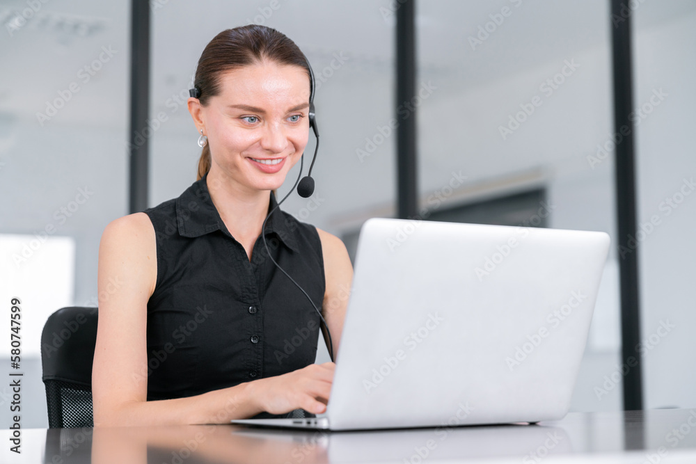 happy business assistant secretary work on business meeting with video conference onlin with computer and head set, or call center and hotline business service concept in modern office happy business assistant secretary work on business meeting with video conference onlin with computer and head set, or call center and hotline business service concept in modern office