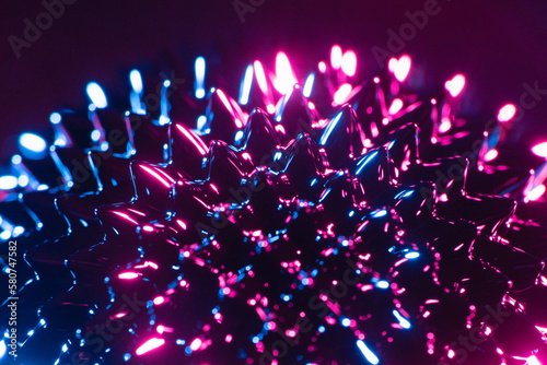 Closeup shiny ferrofluid spikes photo