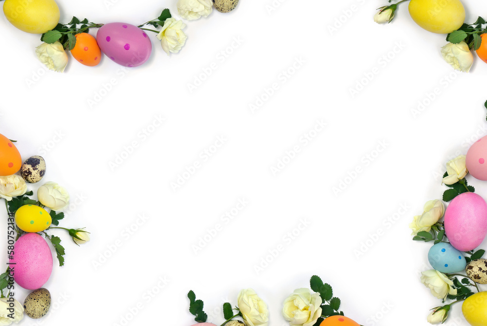 Easter decoration. Easter frame of colored easter eggs and white roses flowers on white background with space for text. Top view, flat lay