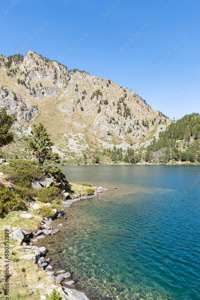 breathtaking beauty of Laurenti Lake in Ariege, Pyrenees, France, captured during summer.