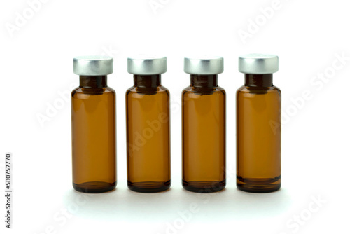 Medical bottle of brown color, for medicine and injection, with a lid, isolated on a white background.