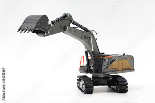Backhoe hydraulic Excavator with bucket. side view. Wide angle. Isolated on white background.	