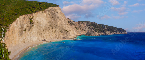 The beautiful beach of Port Katsiki during summer time with turquoise shining ocean on the island of Lefkada, Ionian Sea, Greece 