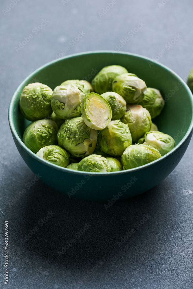Raw Organic Brussel Sprouts in a Bowl, top view. Flat lay, overhead, from above. Copy space. Raw Organic Brussel Sprouts in a Bowl, top view. Flat lay, overhead, from above. Copy space.