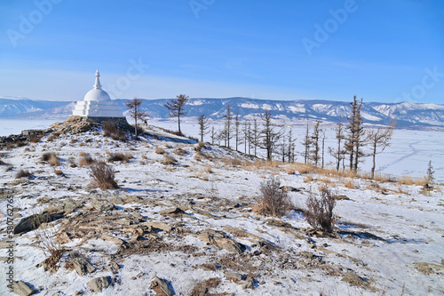 Scenery of Top of Ogoy Island with White Buddhist Stupa at Lake Baikal photo