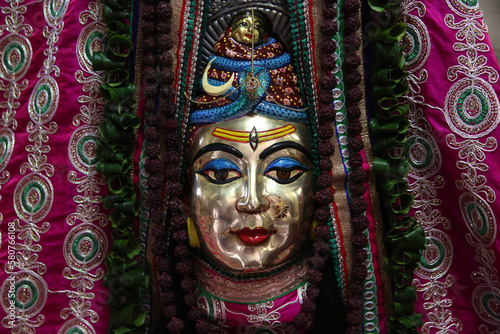 Detail of a Shiva murthi (statue) in a Vrindavan temple.  India.