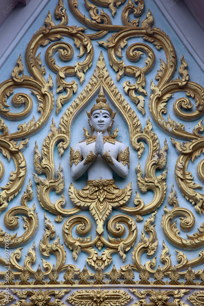 Relief carvings in a Hua Hin temple. Thailand.