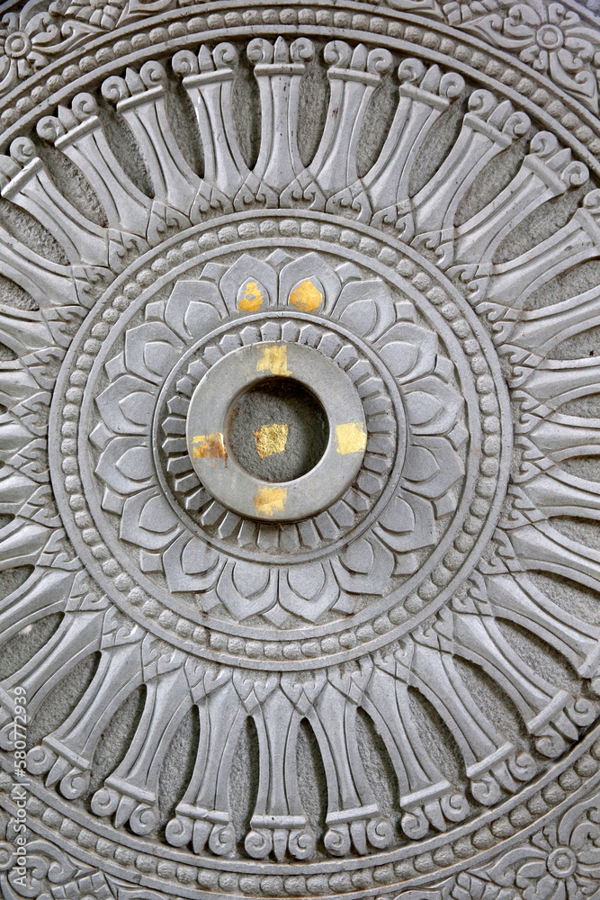 Detail of a Dharma wheel in Wat Pan Sao, Chiang Mai. Thailand.