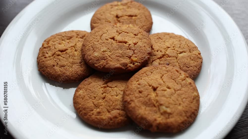 fresh homemade cookies appear on a plate on the table timelapse fresh homemade cookies appear on a plate on the table timelapse
