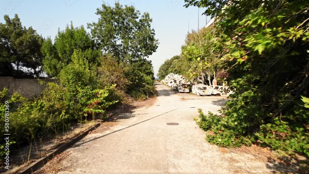 Abandoned Seaside Industrial Complex Car Chasis Bright Sunny Day FPV Fast Fly Through Abandoned Seaside Industrial Complex Car Chasis Bright Sunny Day FPV Fast Fly Through
