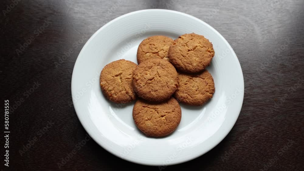 fresh homemade cookies appear on a plate on the table timelapse fresh homemade cookies appear on a plate on the table timelapse