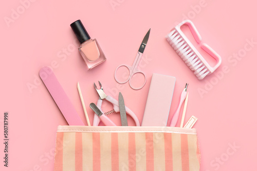 Top view of manicure bag with cosmetics and accessories for manicure or pedicure. Manicure and pedicure concept